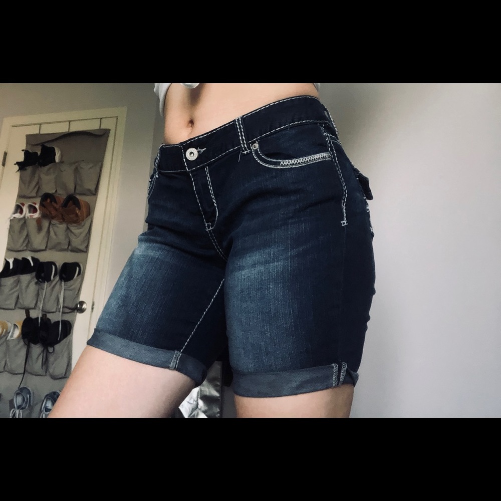 Dark colored jean shorts